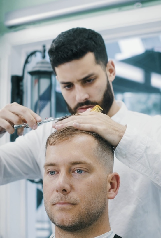 Alejandro working on a precision fade
